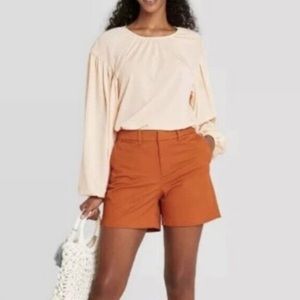 A new day rust colored khaki shorts